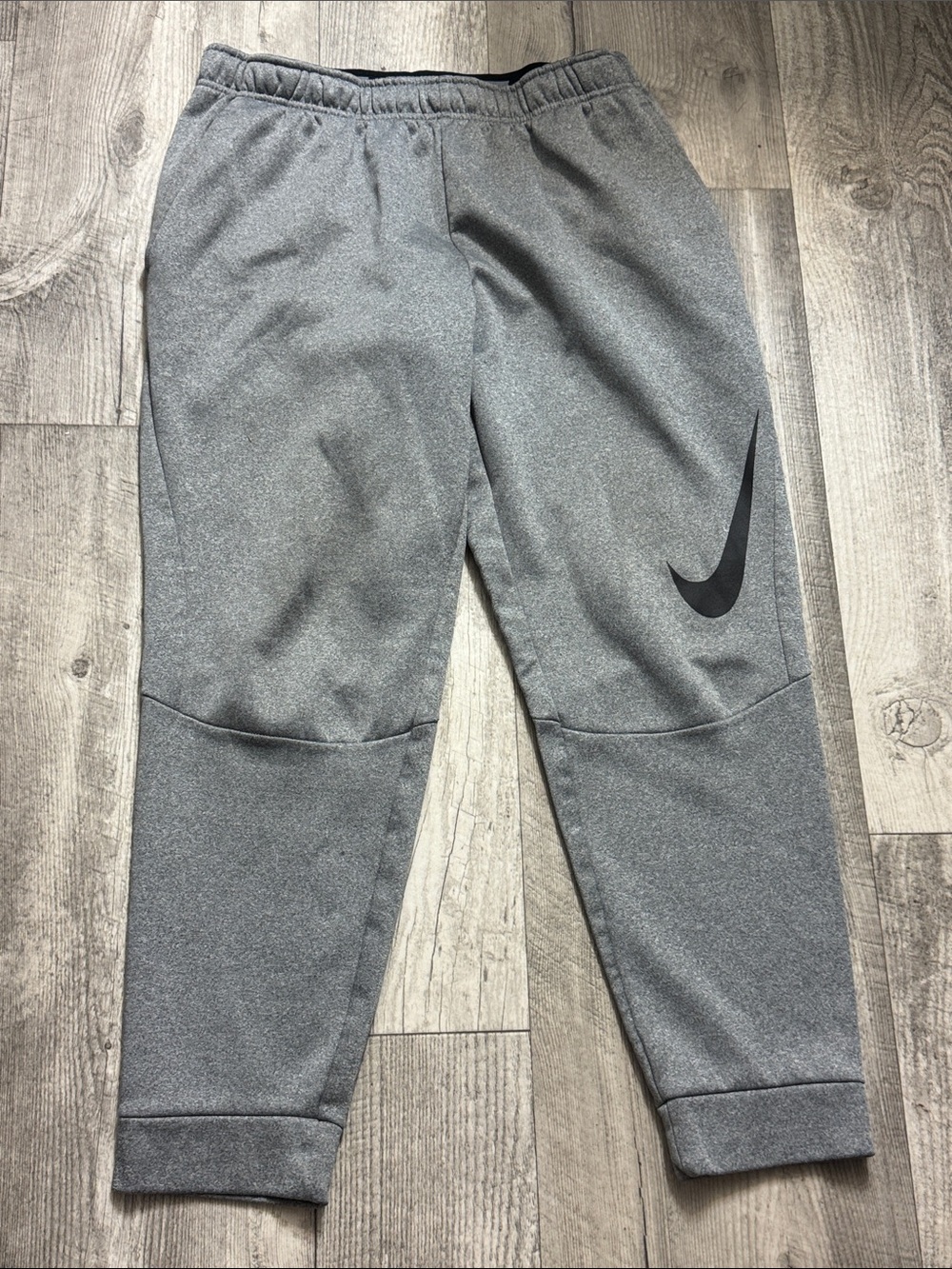 Nike Kids Grey Athletic Joggers with Black Swoosh